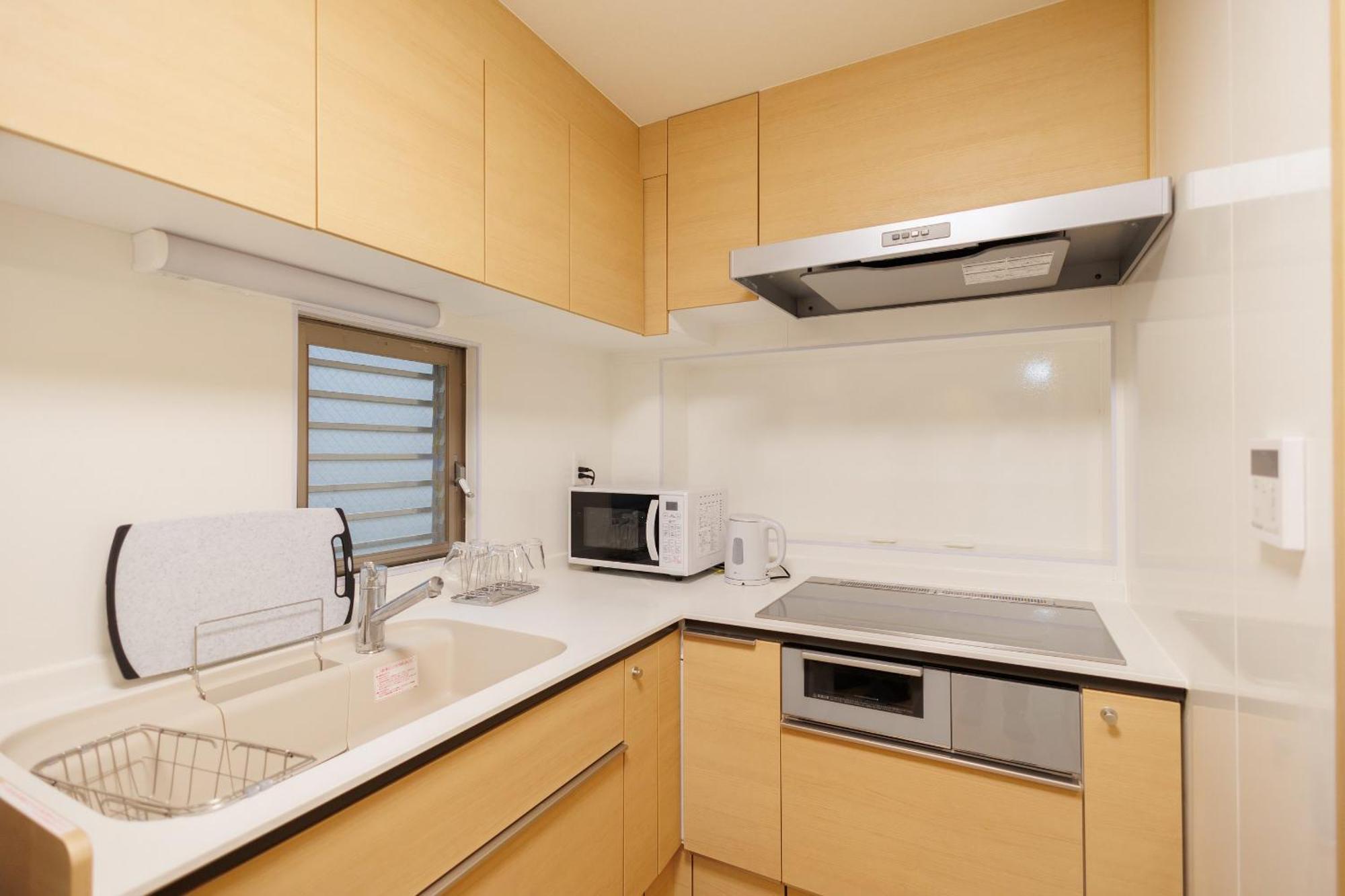 Hotaku Hotel Akihabara طوكيو الغرفة الصورة